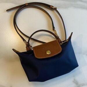 longchamp mini pouch.